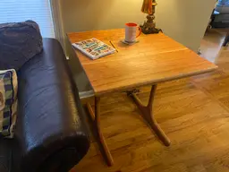 Handcrafted solid Cherry accent table with sculpted Cherry wineglass legs