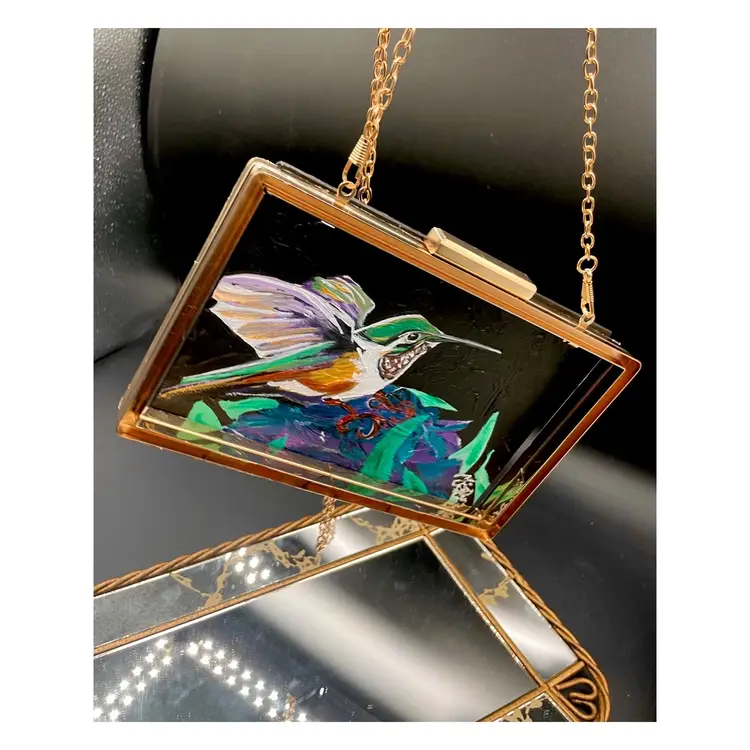 Hanging Out 
New, Original Hummingbird Painting 
On 7”x5” Canvas Board 
Attached To A Gold, 
Preloved Purse Frame
Bird Art