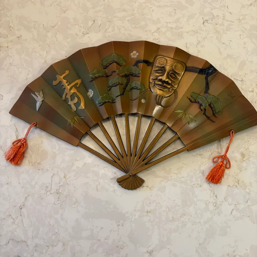 A decoration for the tea ceremony that brings good luck Decorative iron fan