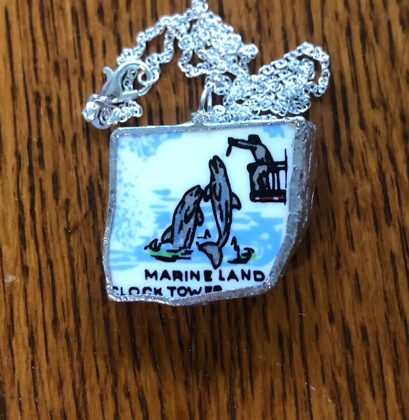 Oodelally Shop Broken Pottery Artisan Made Marineland Pendant Florida Collectors Plate Handcrafted Necklace 1.25in x 1 1/8in