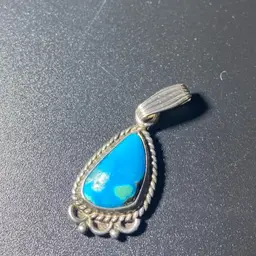 STG And Turquoise Pendent With Marking As Shown Size Of A Dime