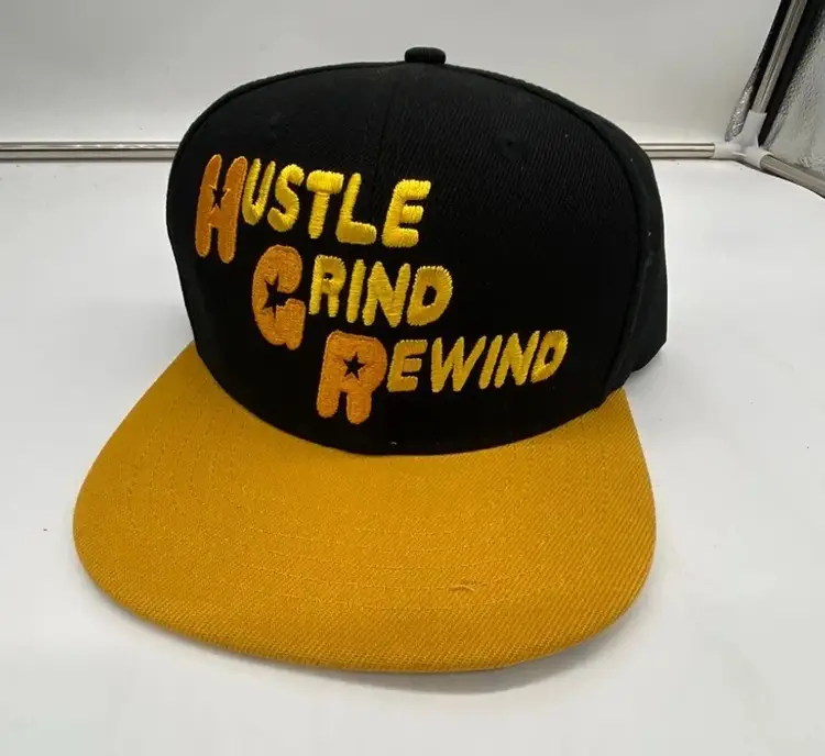 Hustle Grind Rewind Hat Gold Coins