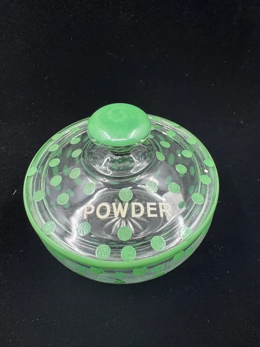 Vintage clear glass powder jar with green polka dots and "POWDER" inscription
