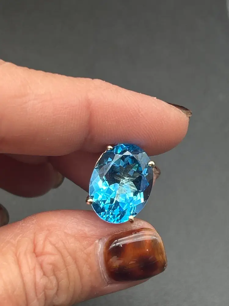 14K Gold Swiss Blue Topaz Oval Pendant – ½ Inch Brilliant Cut