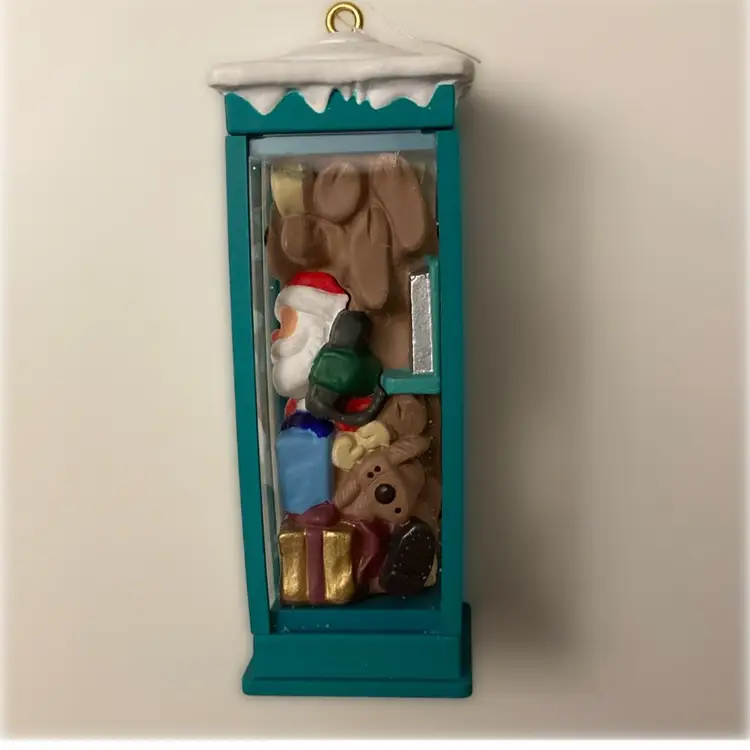 1993 Hallmark “Room For One More”. Santa Stuck In Phone Booth with Reindeer Ornament