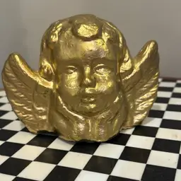 Golden Cupid Statue
