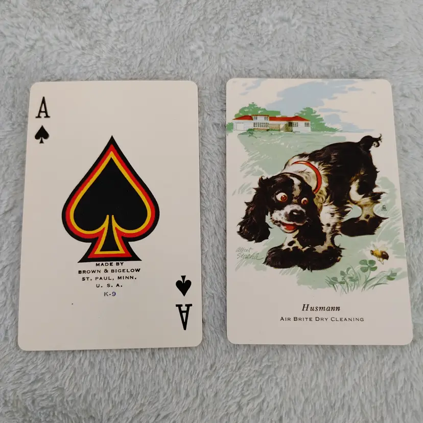 1 Single Swap Card - Playing Card. Cocker Spaniel. Husmann Air Brite Dry Cleaning. Artist Albert Staehle. 1940's. Ace of Spades. Made by Brown & Bigelow in MN. Dimension 2.5 x 3.5. Read description.