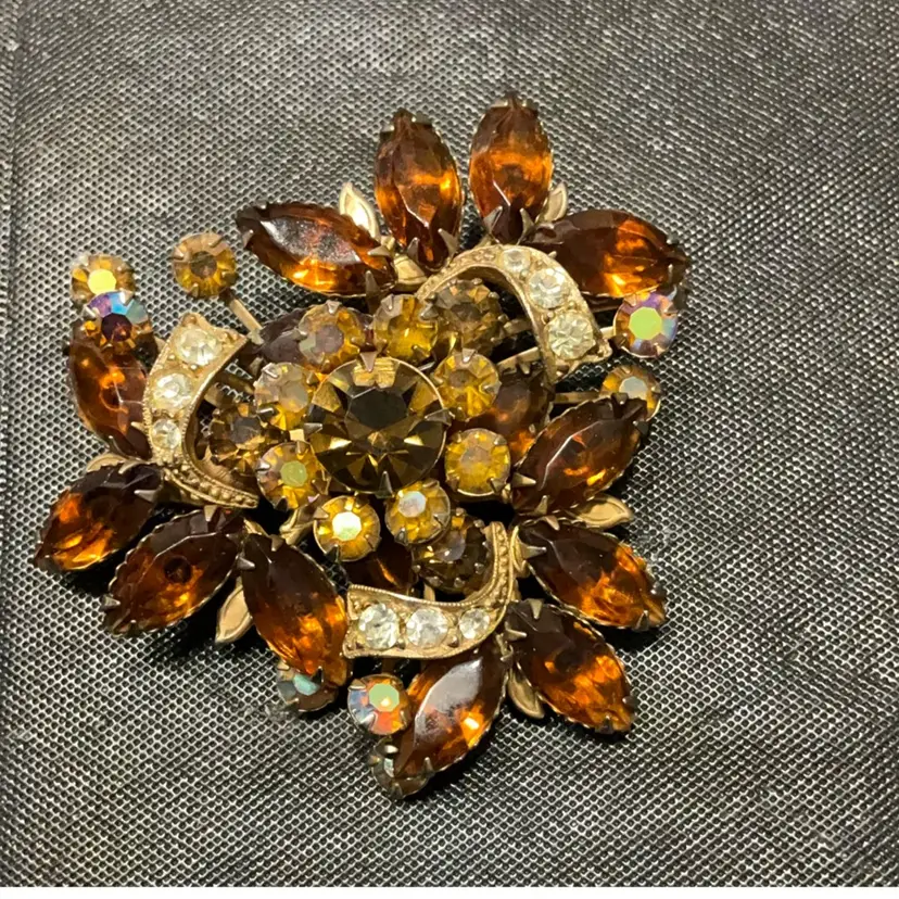 Deep Amber And Clear Rhinestone Brooch. Measures 2.5”x2.25”