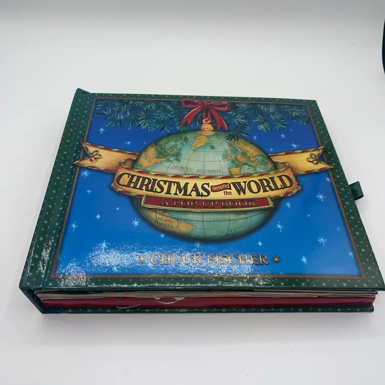 Christmas Around the World: A Pop-Up Book Chuck Fisher History Tradition Travel