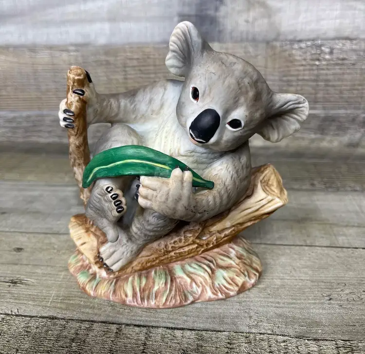 Koala Figure On Eucalyptus Branch
Porcelain Figurine Decor