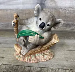 Koala Figure On Eucalyptus Branch
Porcelain Figurine Decor