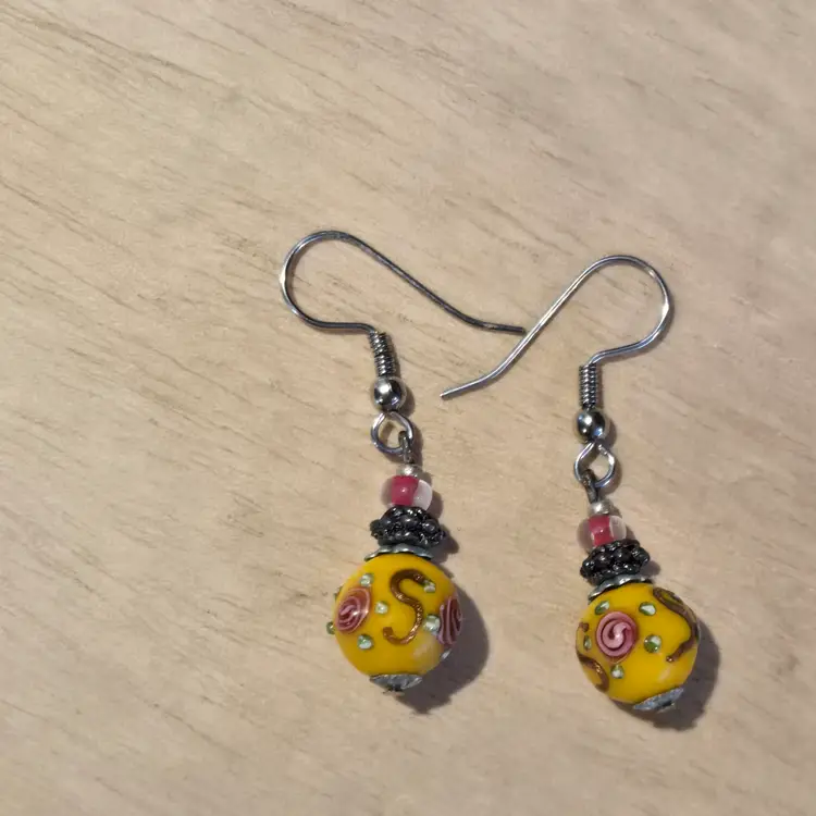 Victorian style painted yellow bead earring