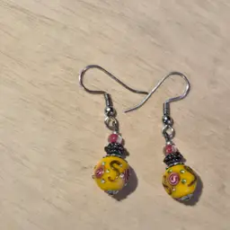 Victorian style painted yellow bead earring
