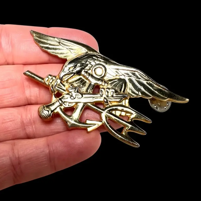 U.S. Navy Seal Eagle Trident Insignia Military Pin With Eagle, Anchor, & Flintlock Pistol Design. Marked V-21-N. Gold-toned Metal.  2-3/4” x 1-1/4”. ** See Condition
