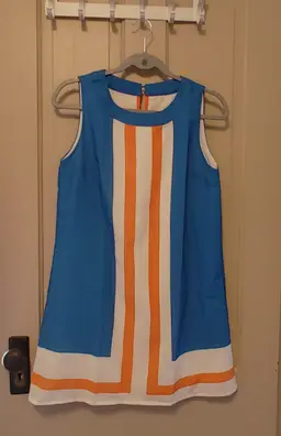 Dress- Brand: Unknown. Blue, white, orange dress. Size Medium. Material- Unknown. No callouts.