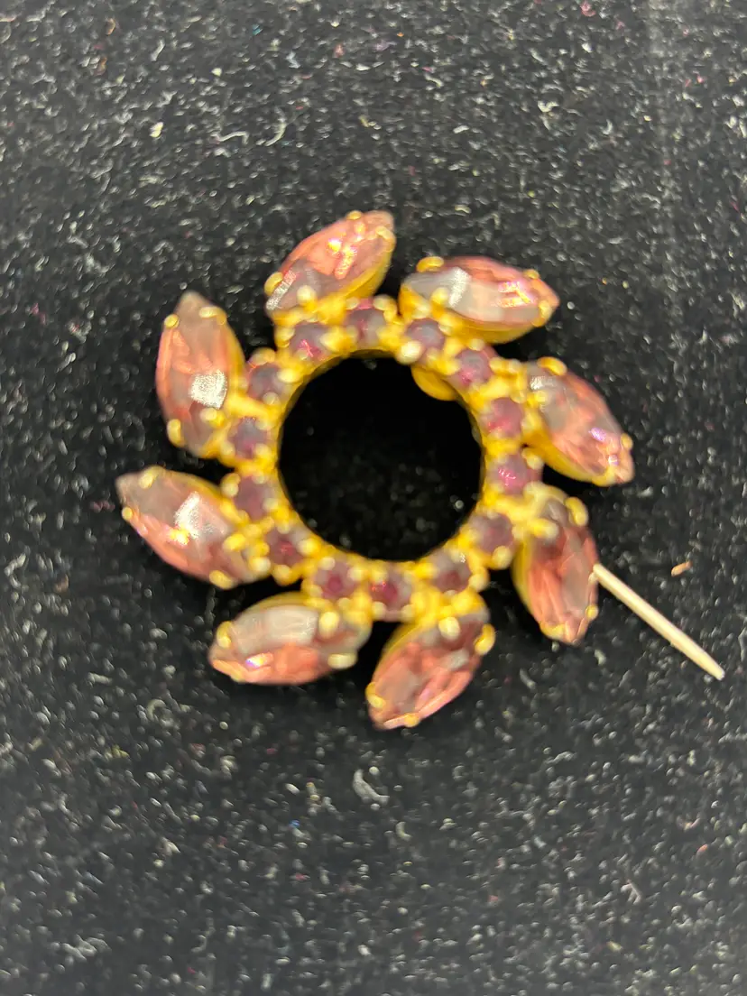 Vintage gold tone purple crystal circle brooch