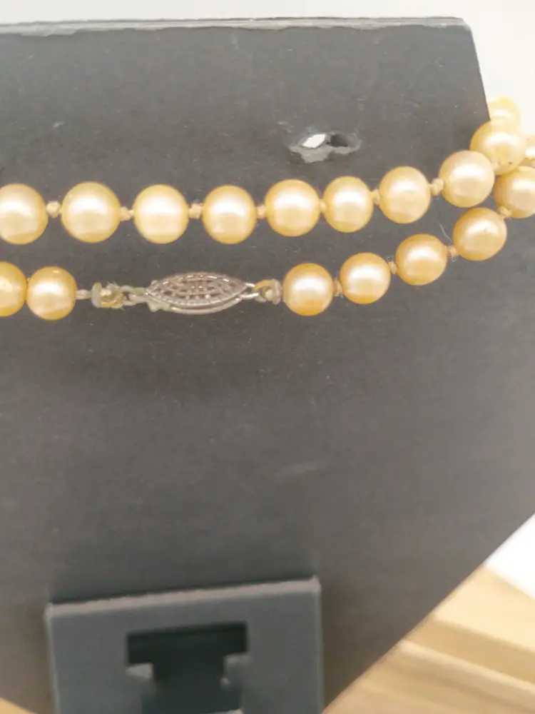 Vintage 56" Opera Length Knotted Lustrous 8 MM Faux Pearl Single Strand Necklace Silver tone clasp.