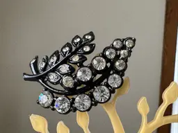 Vintage Black Enamel Or Japanned Metal And Rhinestone Brooch