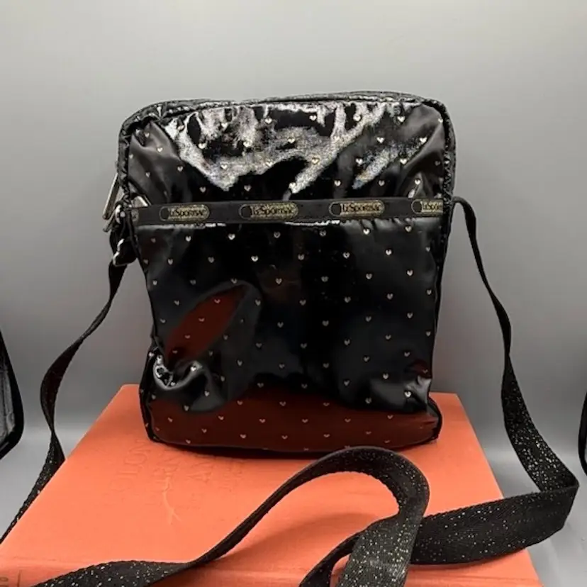 LeSportsac Weather-Proof Patent Heart Crossbody (Glimmer Strap)