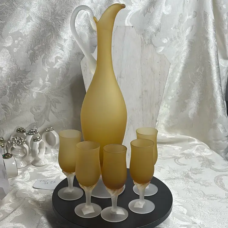 Vintage 60S Glass Decanter And Five Goblets. Approximately 12 inches high decanter goblets are 5 inches high.