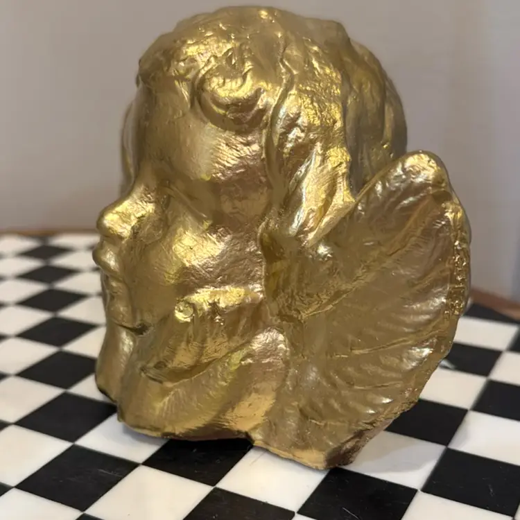Golden Cupid Statue