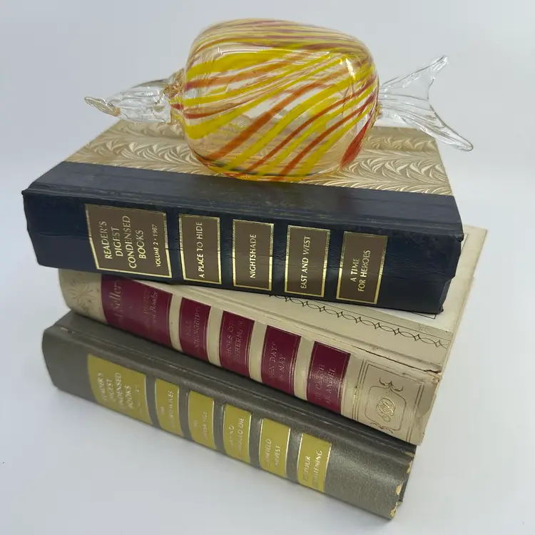 Decorating Vintage Book Stack With Large Glass Candy