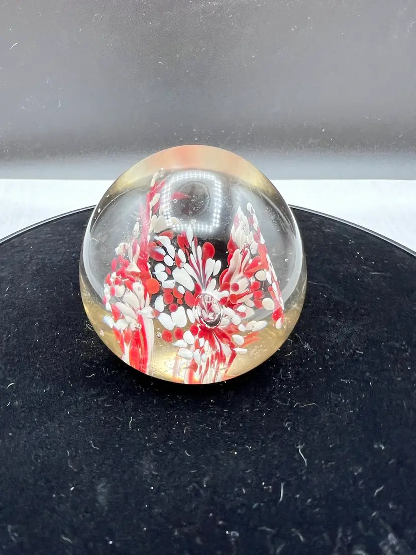 Round Glass Paperweight With Red And White Decoration
Has A Couple Tiny Dings