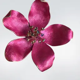 Beautiful Bright Pink Flower With Center Standup Stamina Each Topped With A Colorful Rhinestone