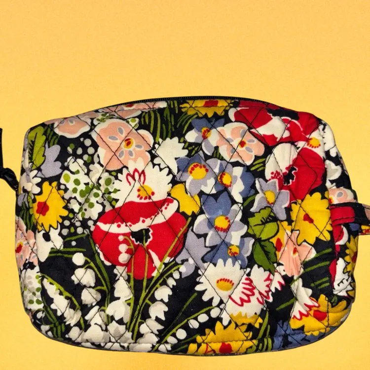 Vera Bradley quilted cosmetic bag in the  "Poppy Fields" pattern.