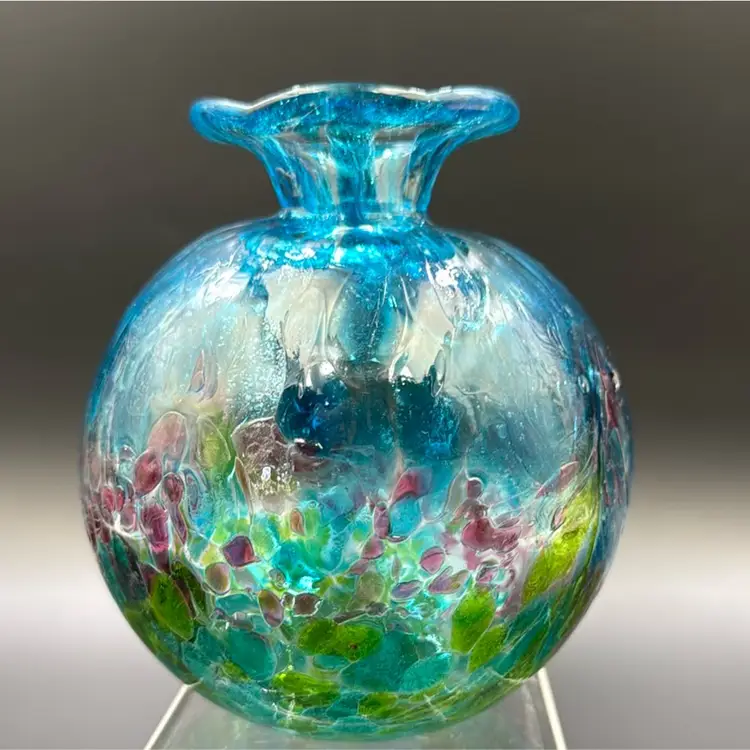 Multicolored art, glass bud face very unique