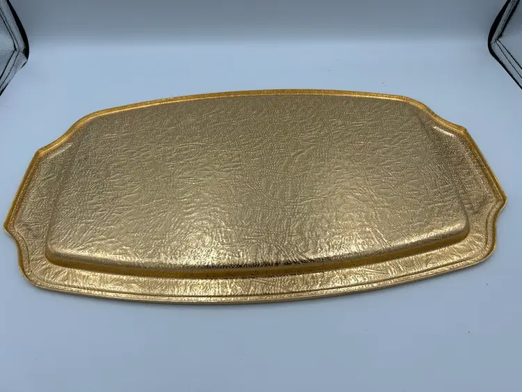 **Gold Aluminum Tray Embossed With Filigree.