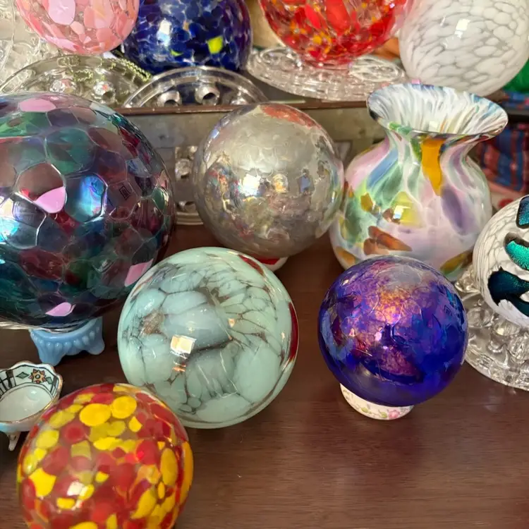 All Sorts Of Glass Orbs 
Different Sizes And Colors