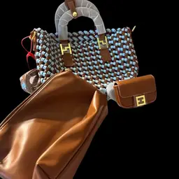 13 - NWT Pleather Woven Handbag With Accessories