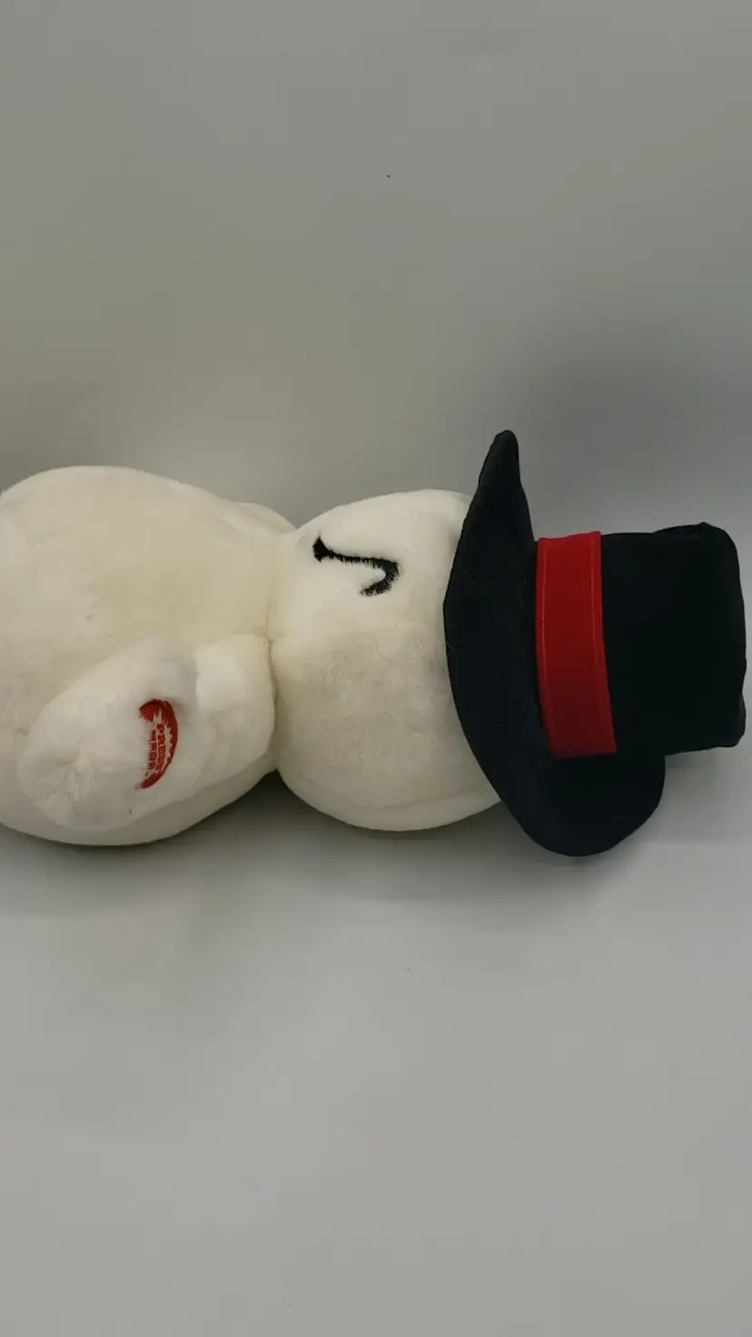 MTY Animated Snowman Plush w/Top Hat Shakes Talks Giggles Works! 14" Vintage. This adorable, animate snowman is sure to make you smile! When you push his button, he shakes and giggles, pauses and then says "Happy Holidays"!. Uses 3 AA batteries. Tested and works! 14" tall.
