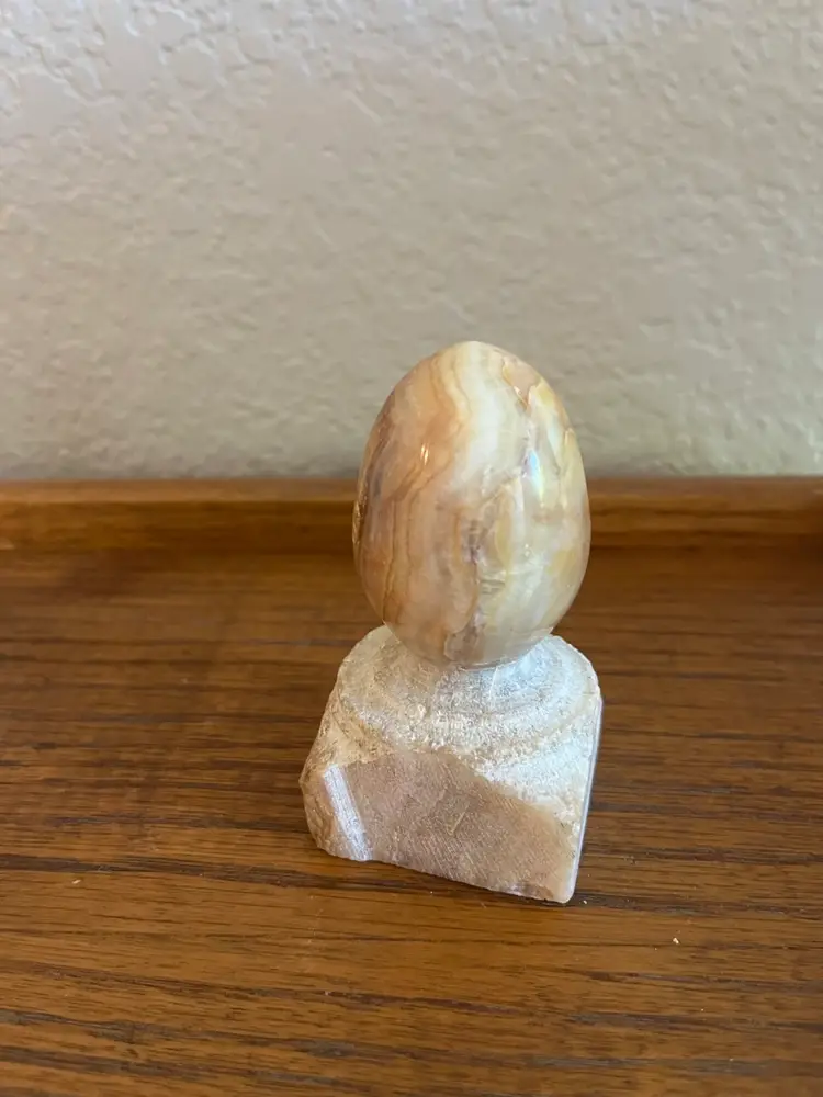 Onyx Egg On Stone Stand