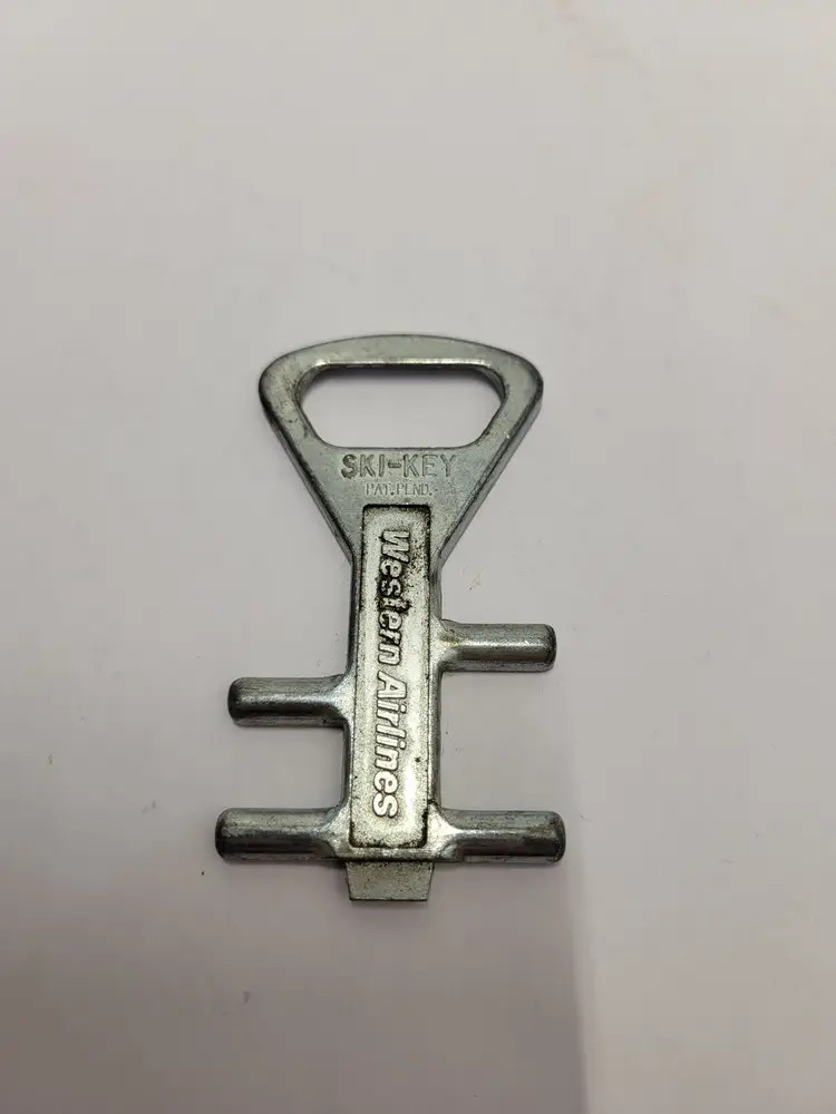 WESTERN AIRLINES VINTAGE SKI KEY & BOTTLE OPENER  1970's
