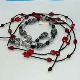 Four Strands of New Beads 3 Red & 1 Black/clear