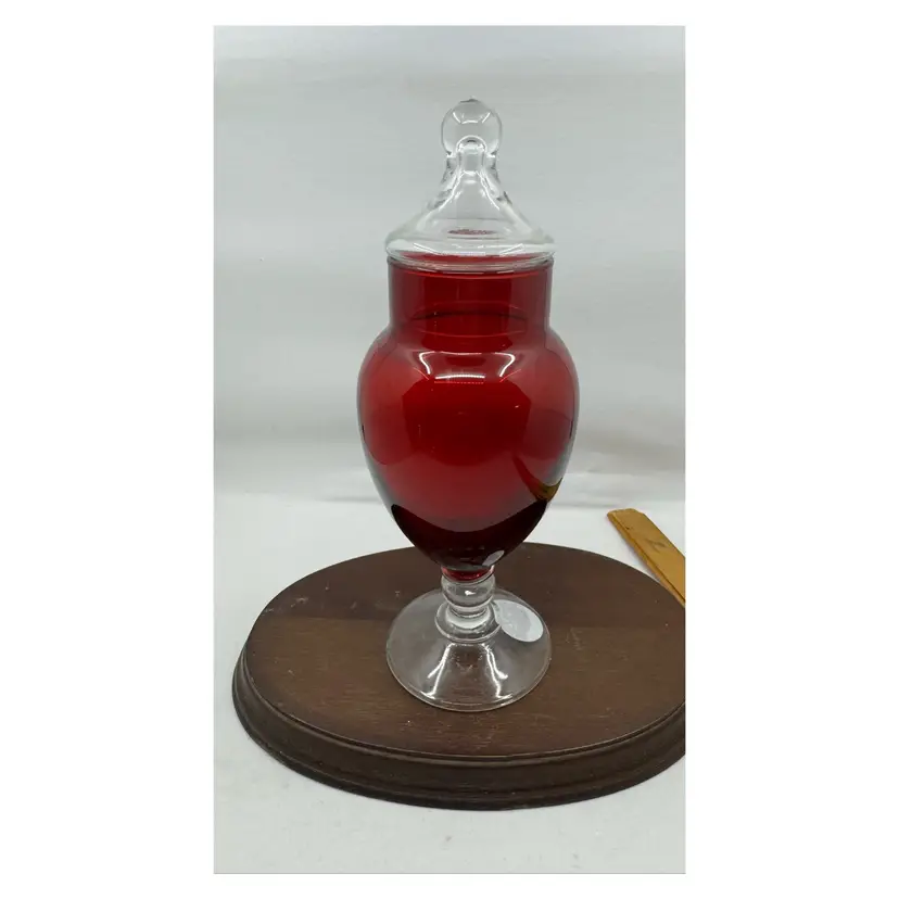 Vintage ruby red glass apothecary jar with clear glass lid and foot-  Empoli?