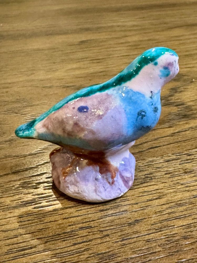 Mini ceramic bird figurine, likely from the Wolfe Studio in Jackson, Mississippi.
Abstract ceramic painting