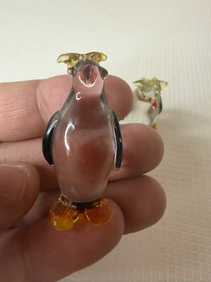 Two Small Glass Penguins One As Is