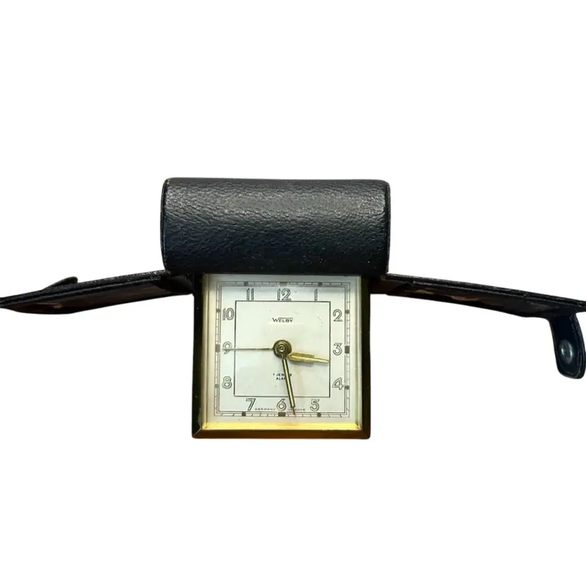 Vintage Welby Travel Alarm Clock 7 Jewel Model Manufactured In Germany In Leather Case. Appears To Be Working
3x3x1