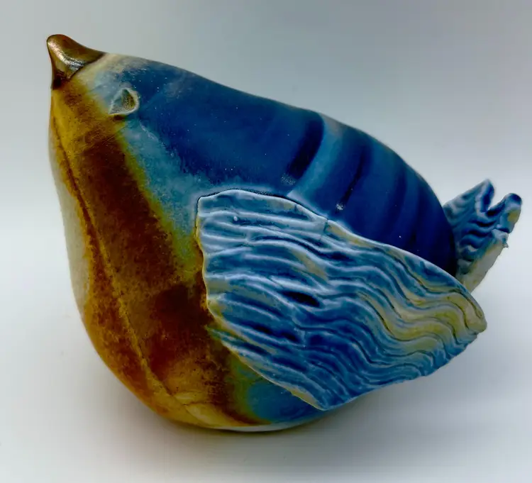 Art pottery chubby bluebird figurine