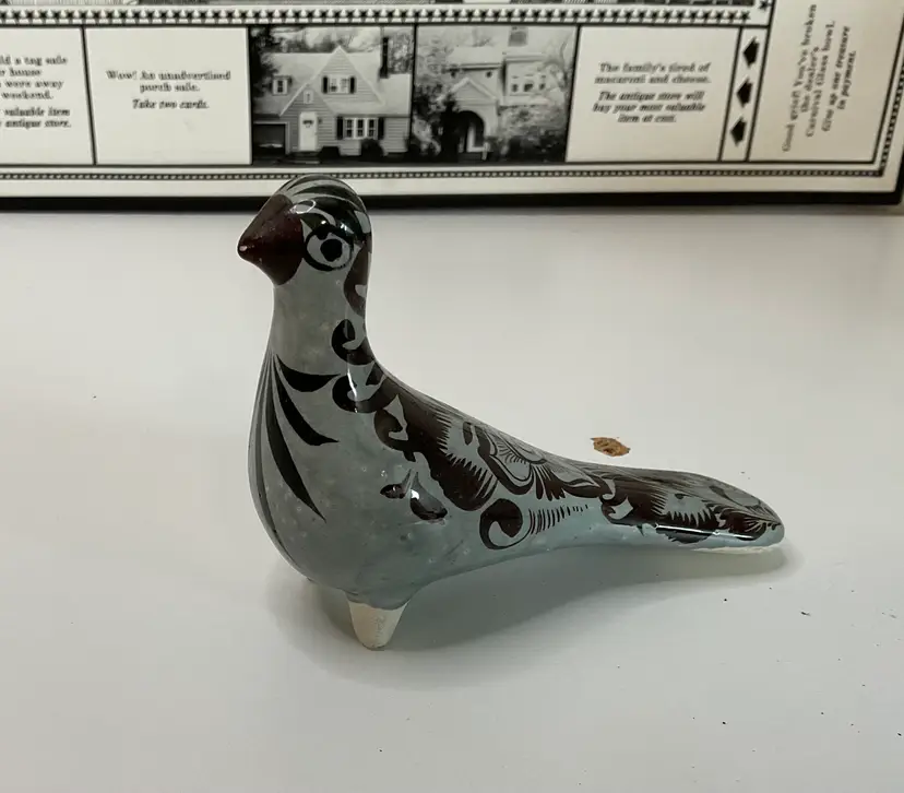 Tonala bird with hand painting, 4” long x 3 1/2” tall, signed by artist