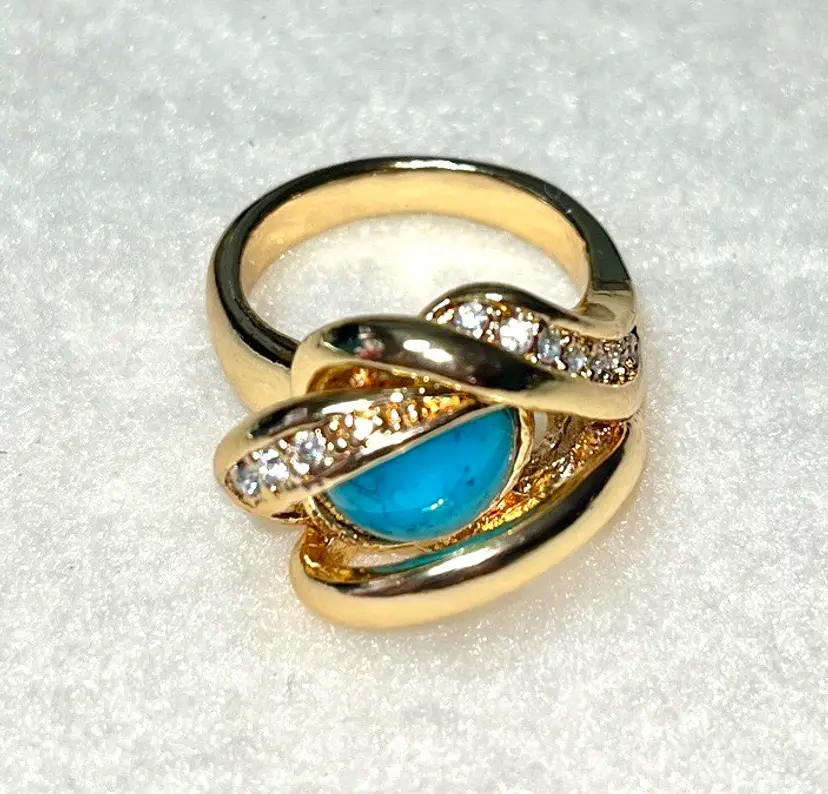 Gold Tone with Turquoise color stone & rhinestones. Size 7.5 Costume