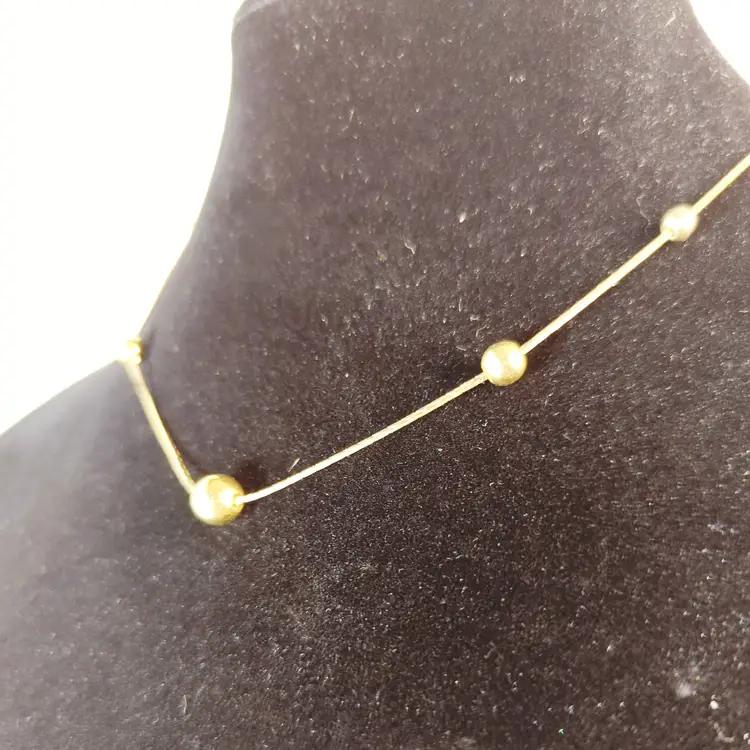 Vintage 80s Gold-Tone Slide Bead Necklace With Clasp