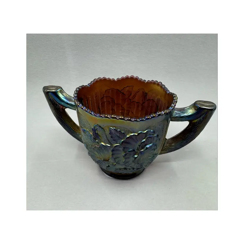 Carnival Glass Creamer With Iridescent Lily And Leaf Pattern