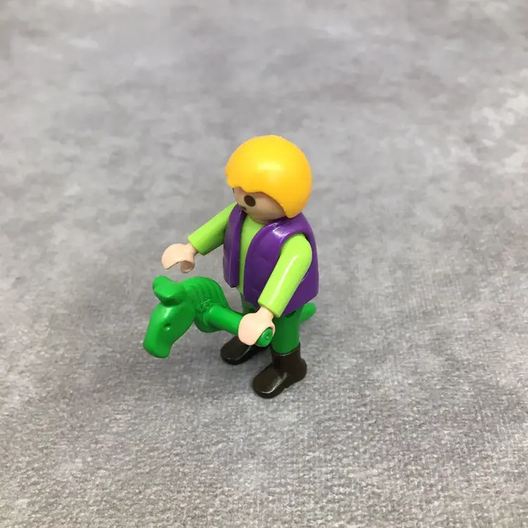 Playmobil Blond Boy with Green Stick Horse- Hair has some imperfections