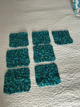 7 completed squares ready for you to craft with. Greens and blues. Beautiful.