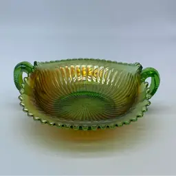 #0321 Northwood green carnival glass two-handled candy dish with ruffled edge.