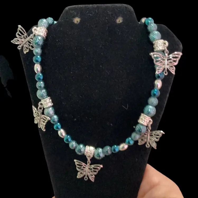 Beautiful Blue And Silvertone Beaded Necklace With Silvertone Butterfly Dangles. Not Signed